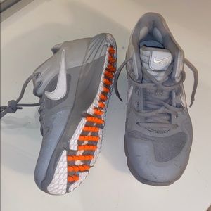 BRAND NEW NIKE TURFS. SIZE 7.5. gray and white